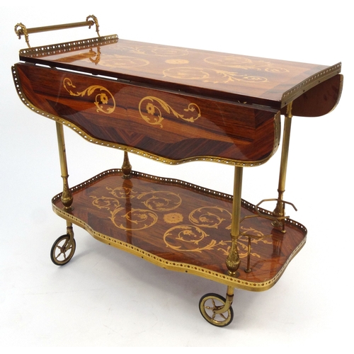 34 - Two tier Sorrento drinks trolley decorated with swags and brass gallery, 75cm high