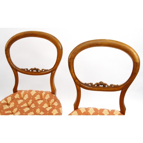 43 - Set of four Victorian walnut balloon back dining chairs with button upholstered seats