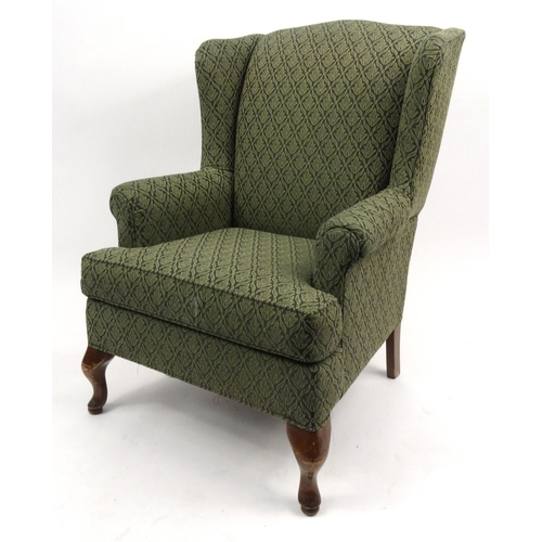 40 - Green floral wingback armchair, 98cm high