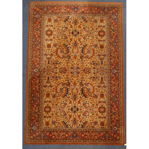 44 - Delphi red geometric patterned wool rug, approximately 300cm x 200cm