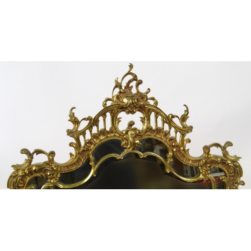 13 - Chippendale design brass framed mirror, with C scroll and acanthus decoration, 105cm x 58cm