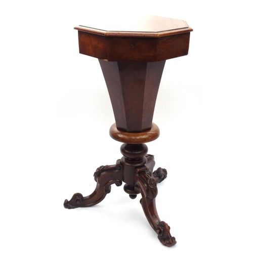 36 - Victorian rosewood trumpet shaped sewing box with fitted interior and rose carved feet, 73cm high