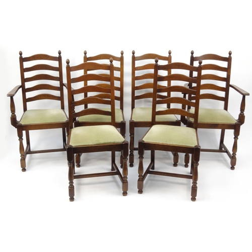 18 - Set of six oak ladderback dining chairs including two carvers, each 102cm high
