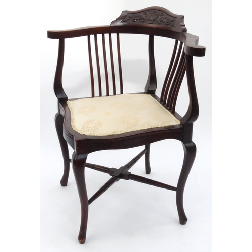 48 - Edwardian carved mahogany corner chair with upholstered seat