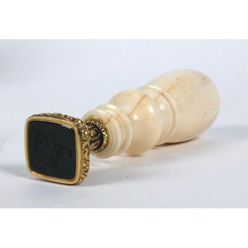 105 - Victorian ivory hardstone seal, 10cm high