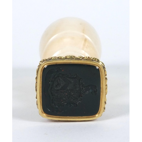 105 - Victorian ivory hardstone seal, 10cm high