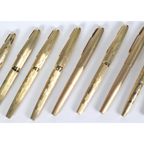 82 - Ten gold plated Parker fountain pens, each 13cm long