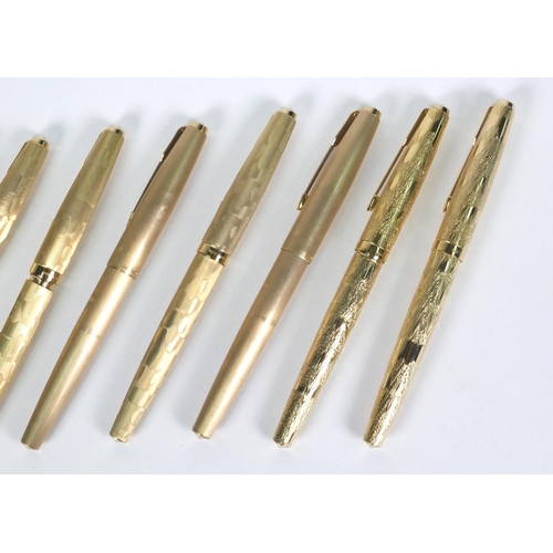 82 - Ten gold plated Parker fountain pens, each 13cm long