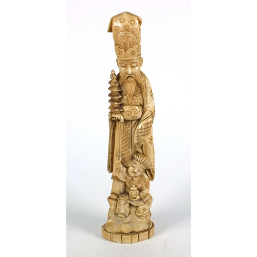 608 - Oriental Chinese ivory carving of an elder and young boy, seal mark to base, 35cm high