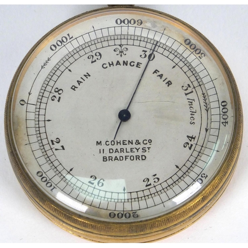 12 - Brass pocket barometer with silvered dial, M. Cohen & Co, 11 Darley Street, Bradford, 4.5cm diameter