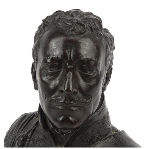 9 - Victorian bronze military interest model of an officer of the Hussars, 27cm high