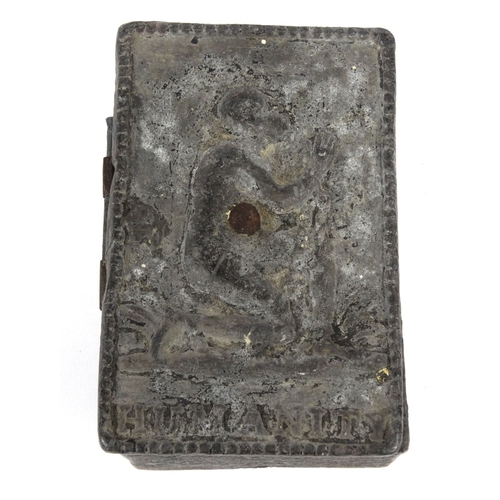 4 - Antique lead slavery interest box, the top decorated with a man and marked 'Humanity', 13.5cm diamet... 