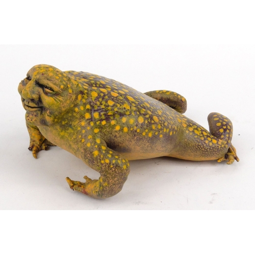 229 - Novelty interest painted leather toad with ugly face, 20cm diameter