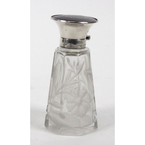 211 - Floral cut glass scent bottle with silver and tortoiseshell lid, London 1916-17, 10.5cm high