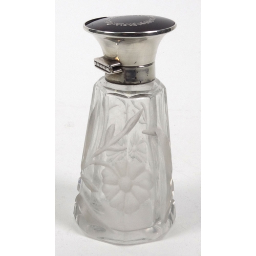 211 - Floral cut glass scent bottle with silver and tortoiseshell lid, London 1916-17, 10.5cm high