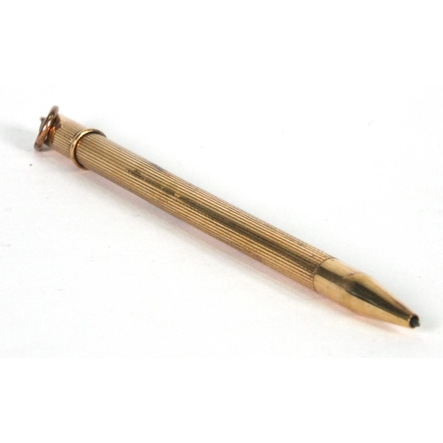 102 - 9ct gold propelling pencil, 9cm long