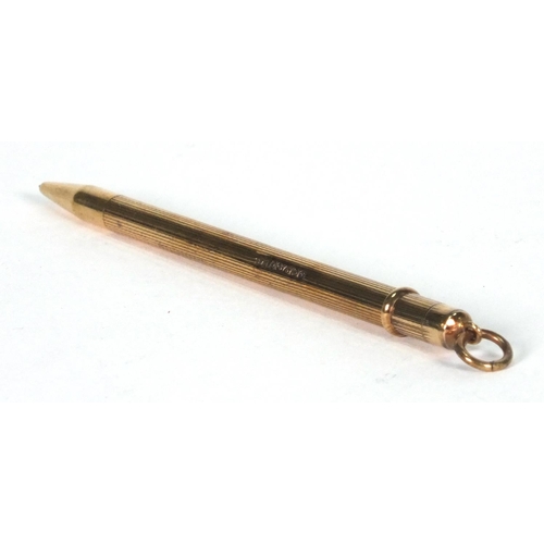 102 - 9ct gold propelling pencil, 9cm long