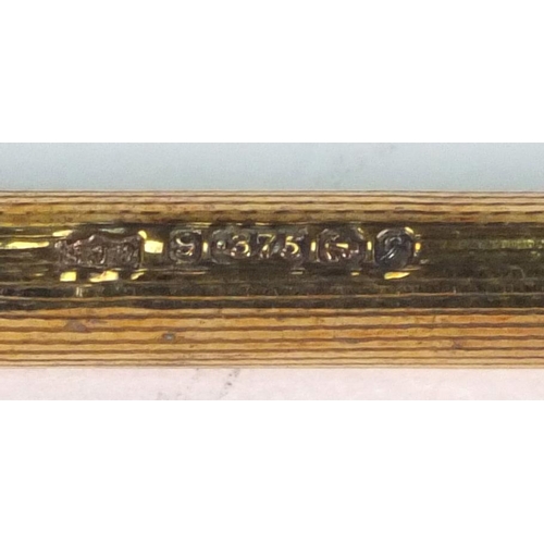 102 - 9ct gold propelling pencil, 9cm long