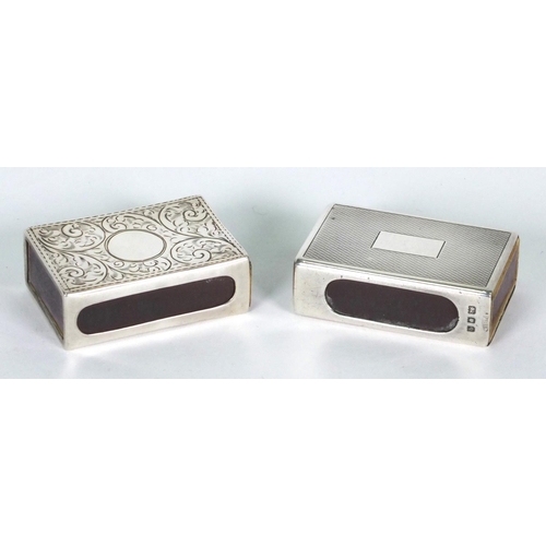 116 - Two silver matchbox cases with engine turned and floral chased decoration, 4.5cm long