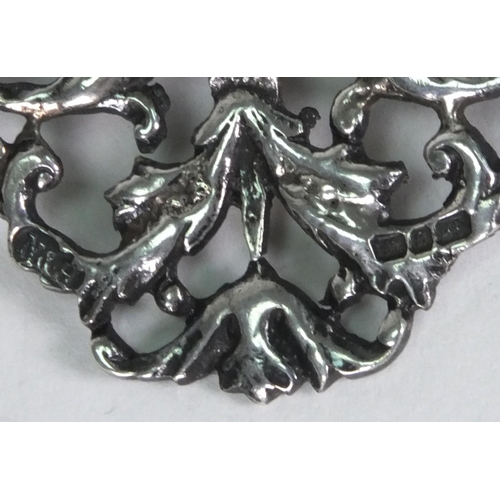 187 - Silver belt buckle with floral decoration, Birmingham hallmarked, 9cm long