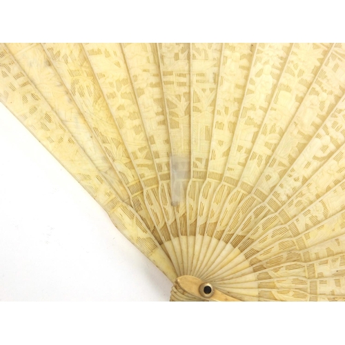 612 - Oriental Chinese ivory fan carved with scenes of elders, 17cm long