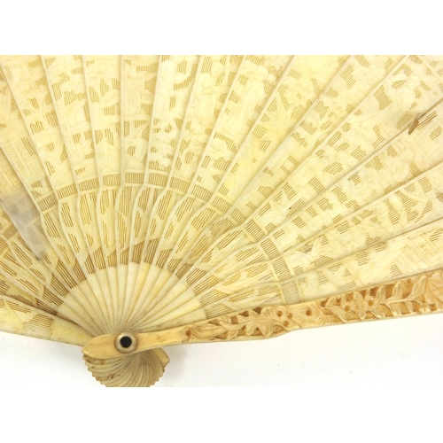 612 - Oriental Chinese ivory fan carved with scenes of elders, 17cm long