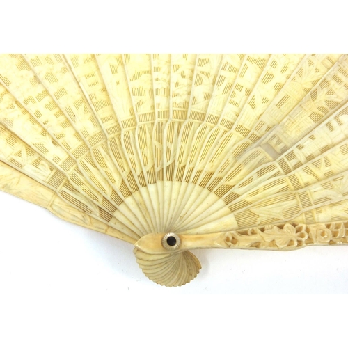 612 - Oriental Chinese ivory fan carved with scenes of elders, 17cm long