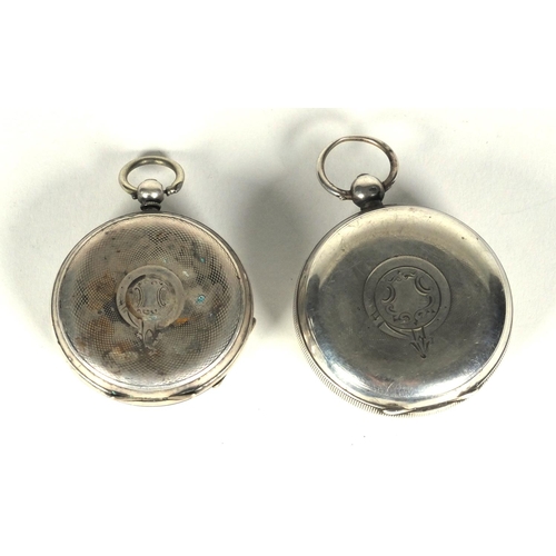 1294 - Two gentleman's silver open faced pocket watches and two silver watch chains