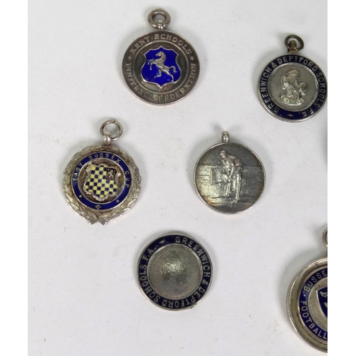 237 - Selection of sporting interest silver and silver metal jewels including cricket, football, some with... 