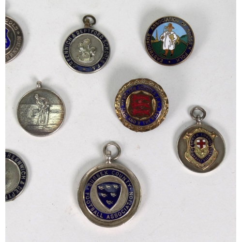 237 - Selection of sporting interest silver and silver metal jewels including cricket, football, some with... 