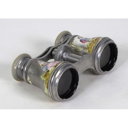 201 - Pair of opera glasses hand painted with lovers, housed in a red velvet case, 10cm long