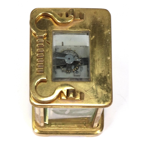 1303 - Brass carriage clock with enamel dial, 11cm high excluding the handle