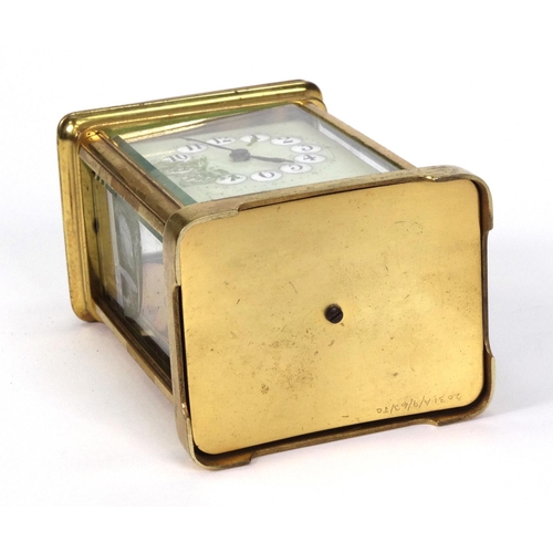 1303 - Brass carriage clock with enamel dial, 11cm high excluding the handle