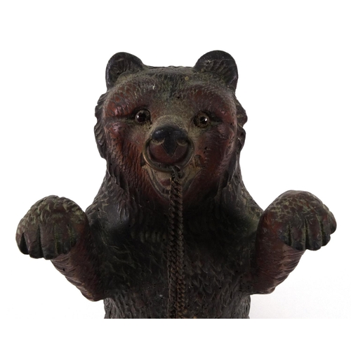 47 - Black Forest carved wooden standing bear with beaded glass eyes, 30cm high