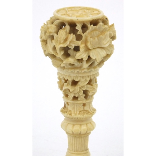 619 - Oriental Chinese ivory and mother of pearl seal with carved floral decoration, 7cm long