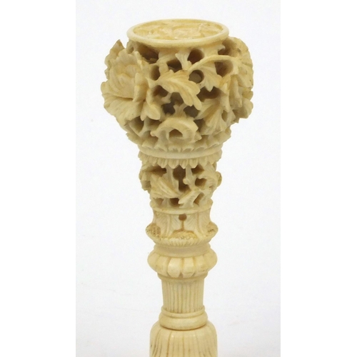 619 - Oriental Chinese ivory and mother of pearl seal with carved floral decoration, 7cm long