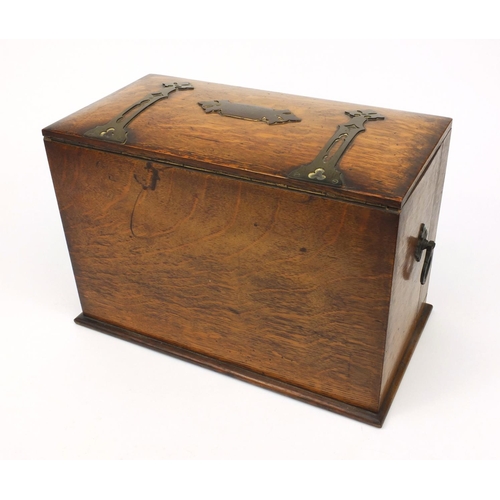 69 - Edwardian brass bound stationery box fitted with two cut glass ink bottles and an assortment of stat... 