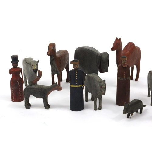 597 - Selection of wooden hand painted Noah's Ark animals and figures including elephants, giraffes and ze... 