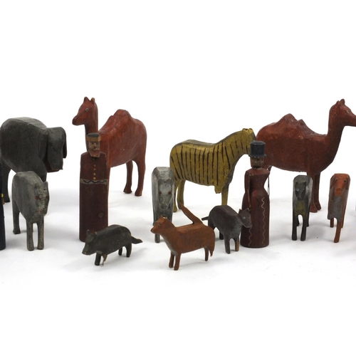 597 - Selection of wooden hand painted Noah's Ark animals and figures including elephants, giraffes and ze... 