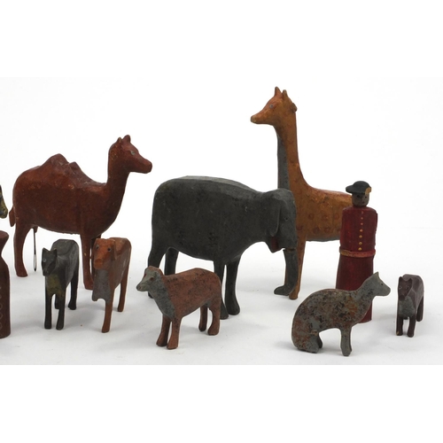 597 - Selection of wooden hand painted Noah's Ark animals and figures including elephants, giraffes and ze... 