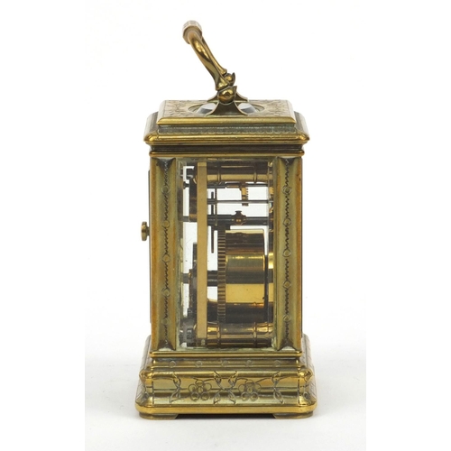 1306 - Miniature brass carriage clock, with floral and enamel dial, the movement stamped 01885, 7cm high ex... 