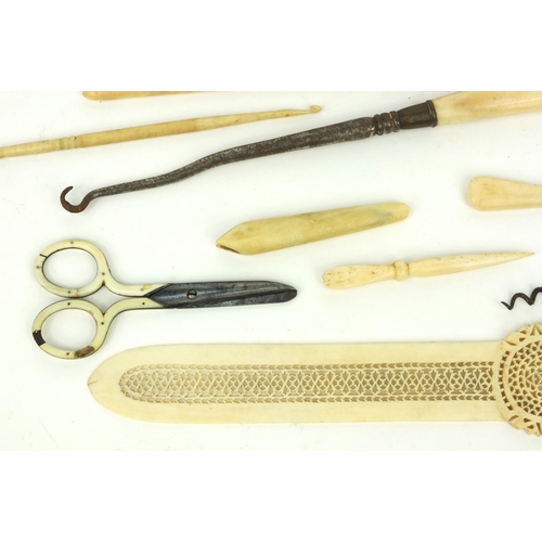 28 - Bone corkscrews, buttonhooks, scissors and a pierced bone letter opener, Samuel Mordan propelling pe... 