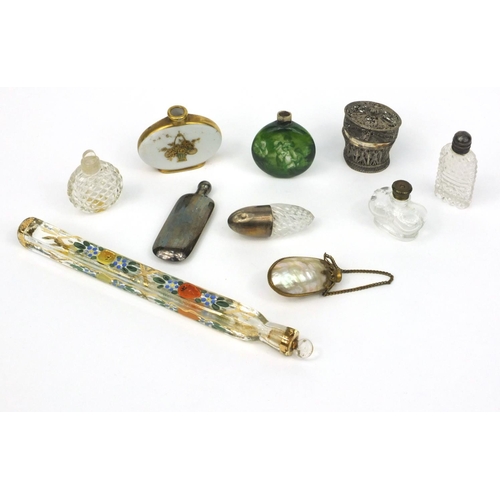 216 - Selection of scent bottles including silver topped cut glass example, porcelain child design example... 