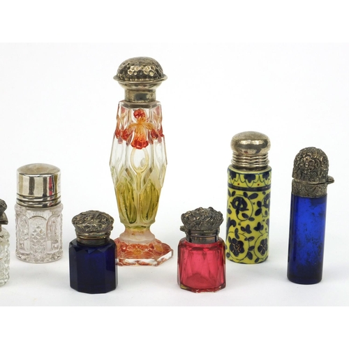 215 - Selection of silver topped cut glass scent bottles including Bristol Blue examples and a floral stai... 