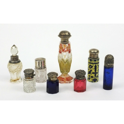 215 - Selection of silver topped cut glass scent bottles including Bristol Blue examples and a floral stai... 