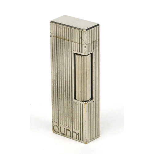 117 - Two Dunhill silver plated lighters, the larger 6.5cm high