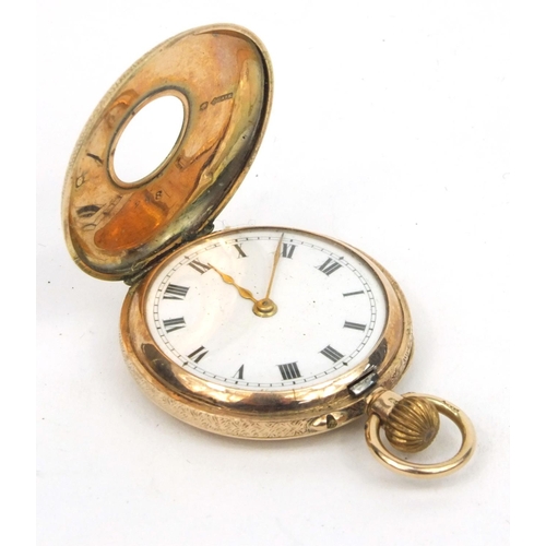 1299 - Lady's 9ct gold and enamelled pocket watch with floral chased decoration, 3cm diameter, approximate ... 