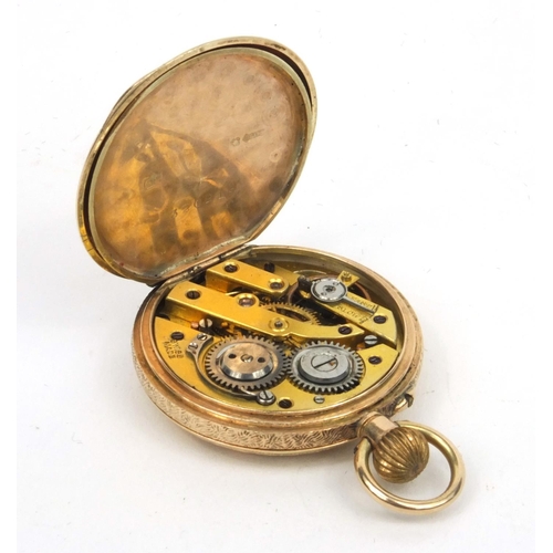 1299 - Lady's 9ct gold and enamelled pocket watch with floral chased decoration, 3cm diameter, approximate ... 