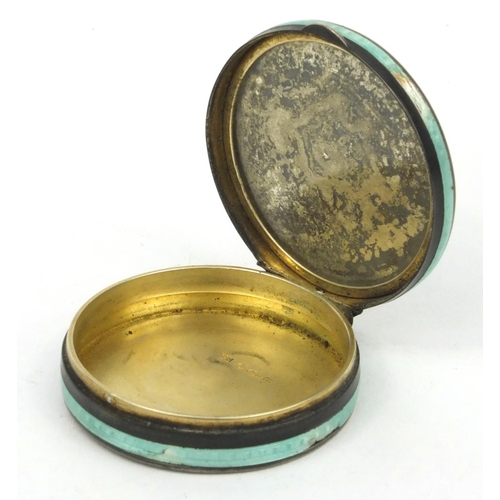 198 - Circular silver pill box enamelled with a figure of a cavalier with feather hat, stamped '925' to th... 