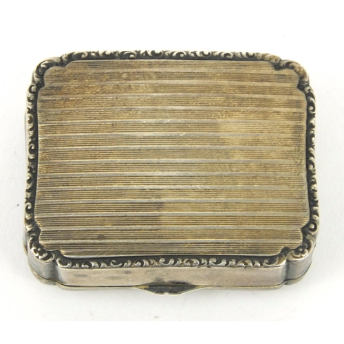 197 - Rectangular silver compact with purple enamel marcasite lid, stamped '925' to the interior, 4cm long